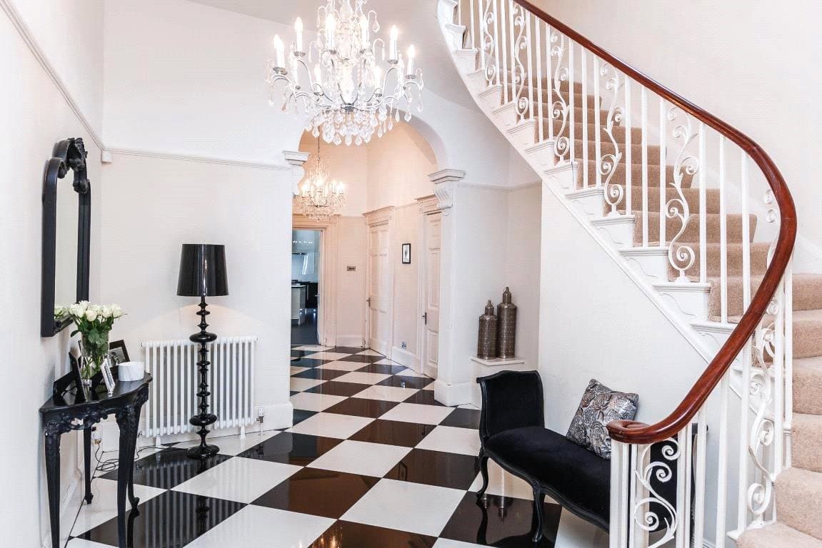 Idsall House — Reception hall and cantilevered staircase